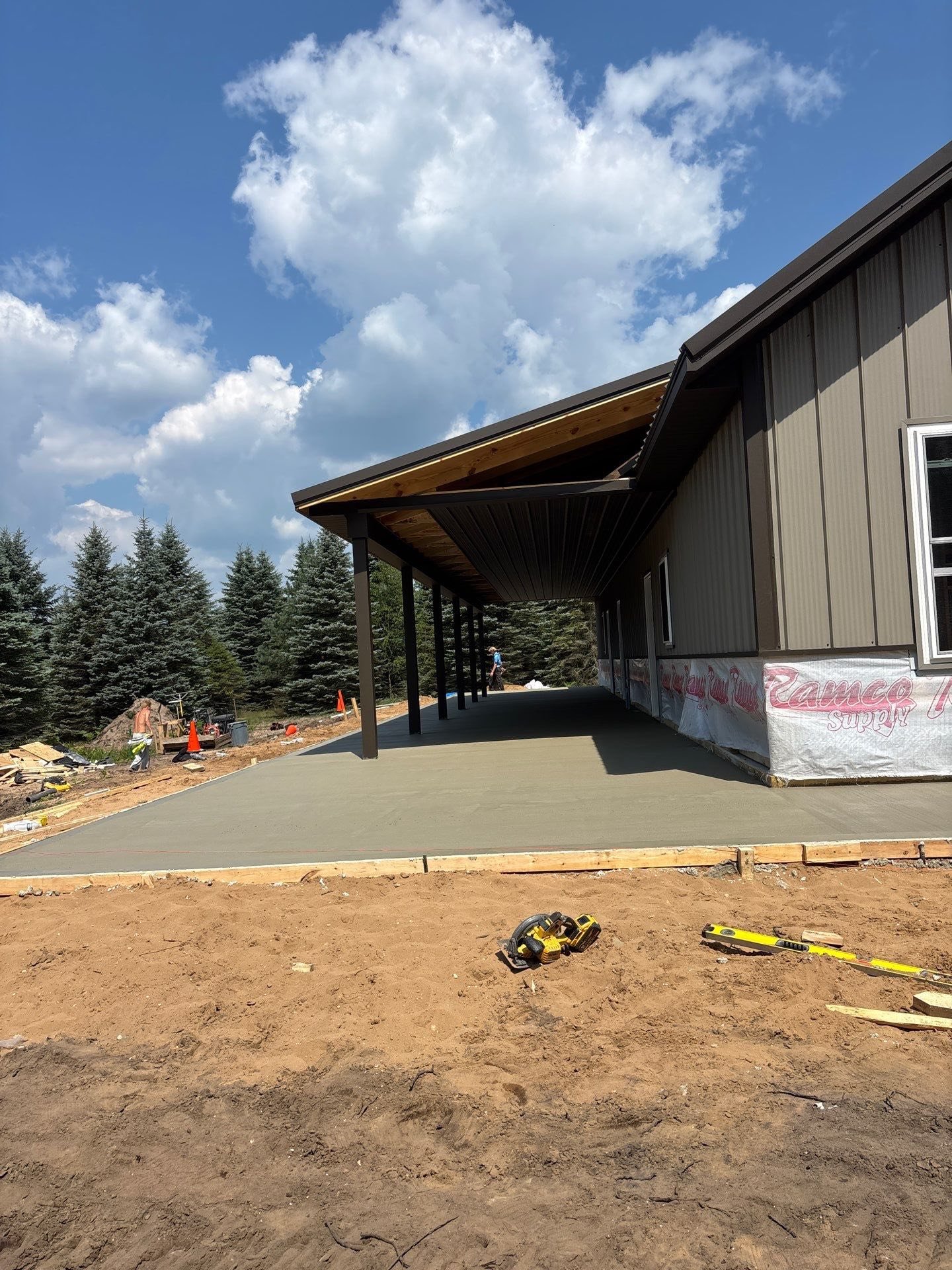 Concrete flatwork pour with clean finish