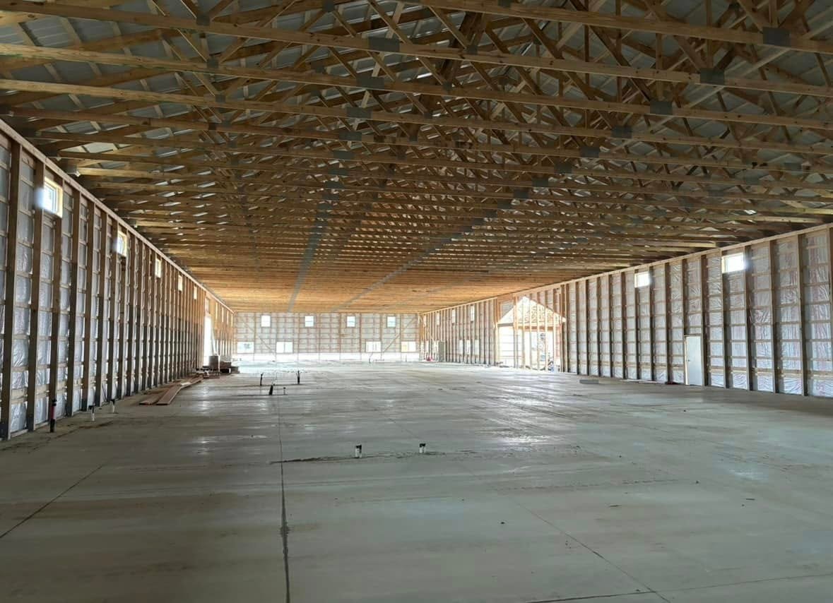Large pole barn interior by Hershberger Construction